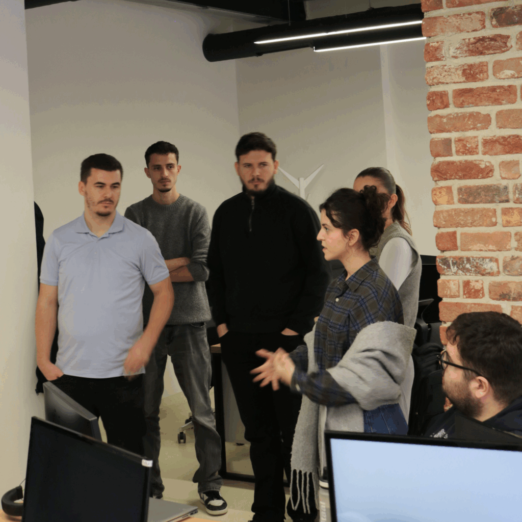 AnchorzUp PM talking to students during their visit at AnxhorzUp