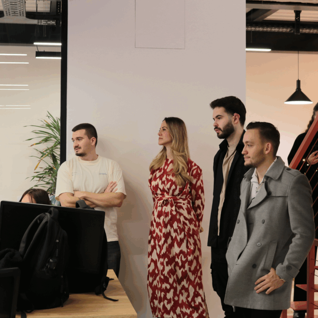 AnchorzUps team memeber and students listening to a team member talking about his journey at AnchorzUp