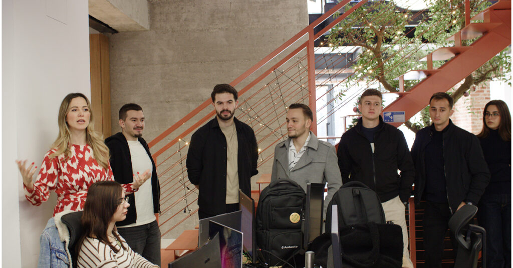 Jeta Zagragja welcoming students with a speech during company visit at AnchorzUp